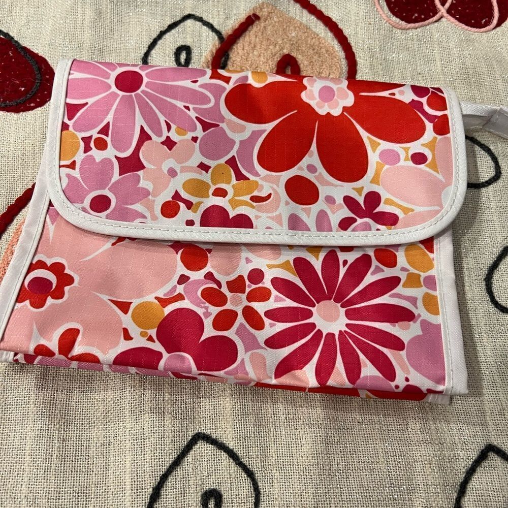 Vintage like new Clinique zippered and button floral cosmetics  bag